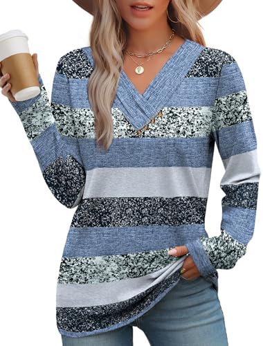 Crisp blue stripes run across this soft long sleeve tunic, finished with a neat V-neckline and decorative center buttons.