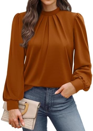 Delicate front pleats and a rich caramel tone give this mock neck tunic a polished look for breezy mornings and cool evenings.