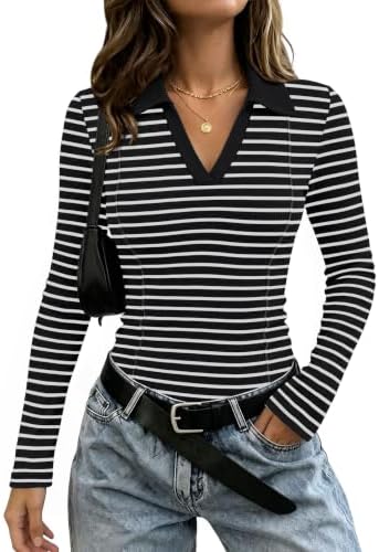 Classic black and white stripes meet a neat polo collar and subtle front ruching in this fitted long sleeve top.