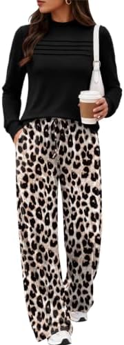 A mock neck tunic meets wide-leg bottoms in our muted black leopard print, cut for long travel days and casual dinners.