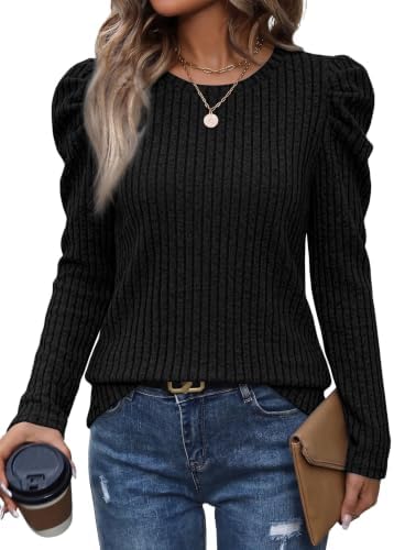 Gathered puff sleeves and a deep black knit make this tunic sweater an easy layer over skirts, tailored trousers, or faded denim.