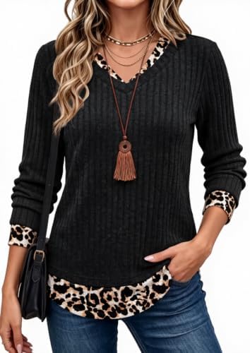 A ribbed knit body meets a leopard print contrast panel in this lightweight faux two-layer tunic cut for cool evenings.