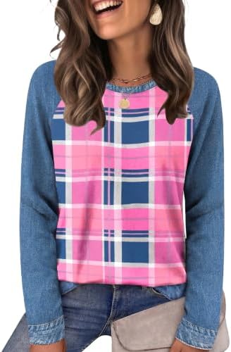A soft crewneck tunic patterned in soft pink plaid, cut with full-length sleeves and enough stretch for cool-weather layering.