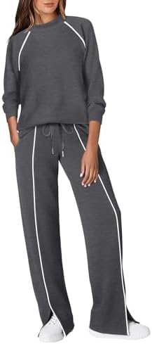 A soft four-way stretch two-piece set in charcoal deepgrey, finished with clean contrast piping and a protective mock neck.
