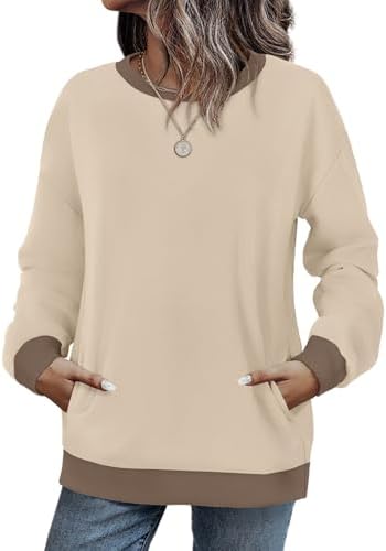 Warm apricot and rich coffee tones split across a light, brushed stretch knit cut with a relaxed crewneck and hidden side pocket.