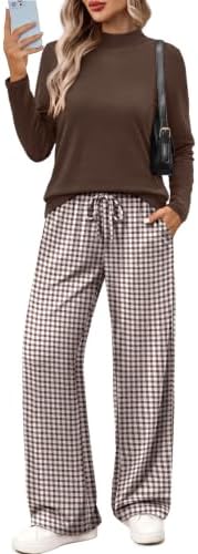 A soft mock neck top meets roomy wide-leg pants in an earthy light brown checkered print made for easy travel days.