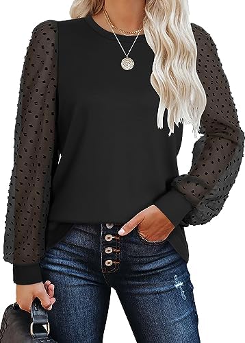 Sheer textured sleeves in solid black turn a soft stretch-knit top into an easy pick for evening dinners and cool nights.