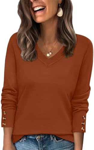 Warm caramel tones and neat buttoned cuffs give this relaxed V-neck tunic an easy balance of texture and drape for cooler weather.