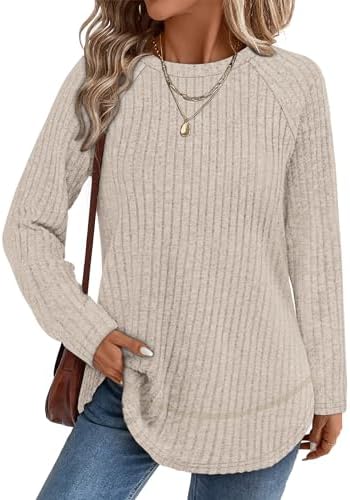 A soft apricot ribbed knit cut with a curved high-low hem and side slits for easy layering over fitted leggings.
