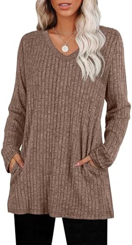 A ribbed knit tunic with side pockets and a relaxed drape, cut long enough to pair easily with your favorite leggings.