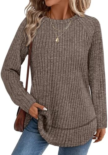 A soft ribbed knit tunic in deep coffee brown, cut with a curved high-low hem and side slits for easy layering over leggings.