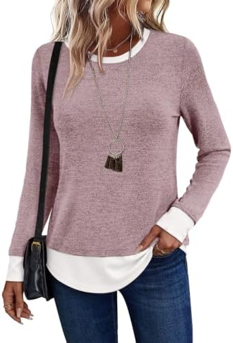 A soft pink knit panel meets crisp white color-blocking on this lightweight tunic top with a gentle crewneck.
