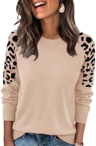 Warm apricot knit body meets jacquard leopard raglan sleeves for an easy pullover that pairs directly with your favorite blue denim.