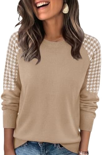 Houndstooth sleeves woven in high-density jacquard frame a soft khaki knit body for crisp weekday layering.