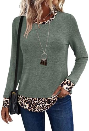A deep green knit meets a spotted leopard hem band on this relaxed crewneck top made for cool mornings.