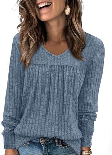 Cool light blue ribbed knit cut with gentle front pleats and a soft V-neckline for easy layering on crisp fall mornings.
