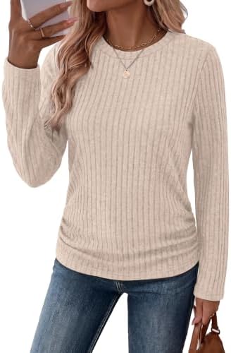 A warm apricot ribbed knit tunic cut with gathered side ruching and full long sleeves for easy autumn layering.
