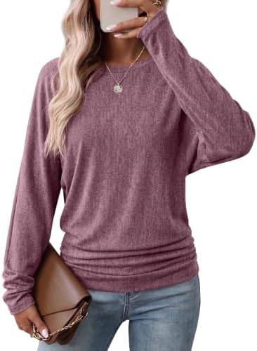 Cut with relaxed batwing sleeves and gathered side ruching, this burgundy tunic brings a deep wine tone to everyday outfits.