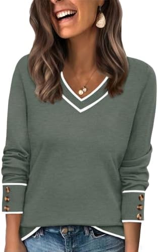 Color block green sections give this relaxed V-neck tunic sweater a clean, balanced look with neat buttoned cuffs.