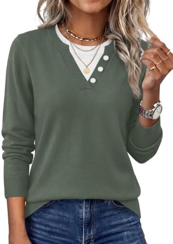 A muted grey green pullover with a contrast collar and subtle striped color-block panels gives the crisp effect of layered knits.