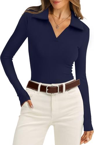 Ribbed navy blue knit brings crisp structure to this long-sleeve polo top, tailored with an open collar and a close fit.