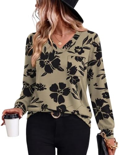 Deep brown tones meet dark botanicals on this long-sleeve knit tunic cut with an open V-neckline.