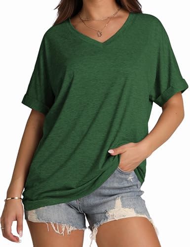 A vivid green knit tee with rolled short sleeves and a soft V-neck, cut loose enough to knot or leave untucked on warm days.