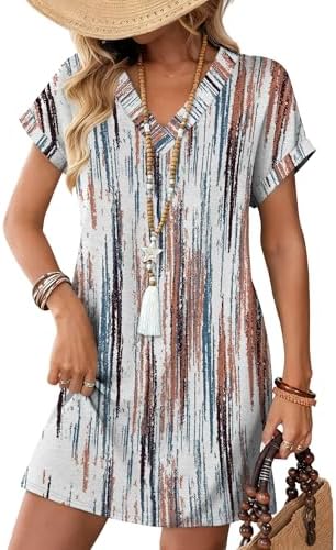A white tie dye pattern washes across this soft t-shirt dress, cut with a relaxed drape, short cuffed sleeves, and side pockets.