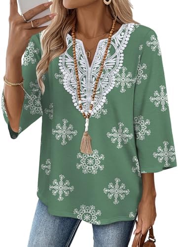 A soft light green print with lace along the front neckline gives this breezy three-quarter sleeve tunic an airy spring feel.