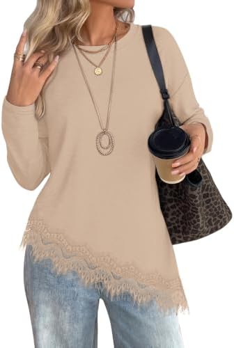 A soft beige knit body meets delicate lace trim along an asymmetrical curved hem for an easy, layered look.