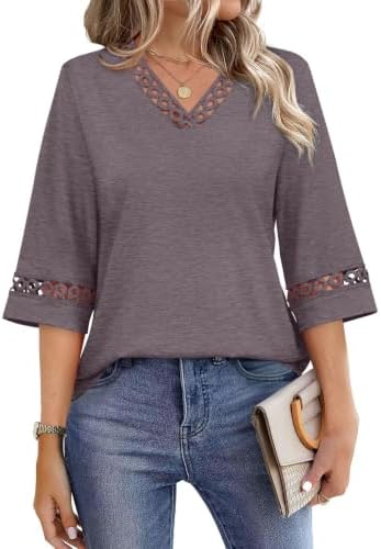 Lace trim frames the V-neckline of this light purple grey top, cut in a soft knit for warm summer afternoons.