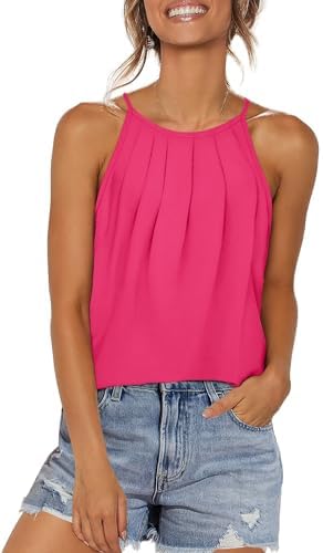 A vivid hot pink tank with a pleated halter neck and a gentle curved hem that falls loose over denim shorts.