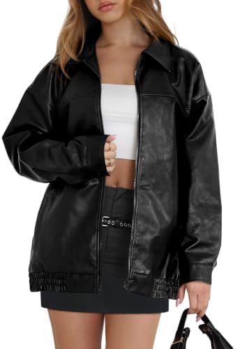 Cut roomy in smooth black faux leather, this oversized moto bomber layers easily over knits and light tees.