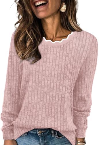 A soft blush pink knit tops off cool-weather layering with a neat scalloped neckline and loose drape.