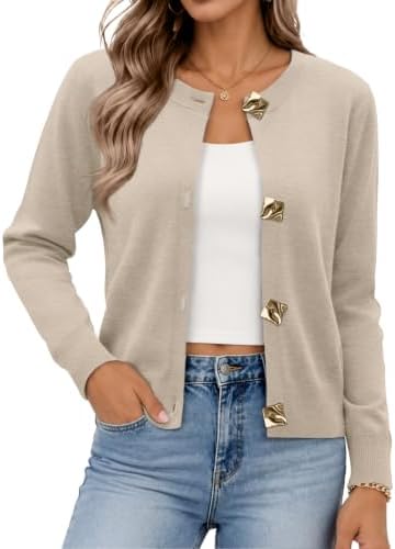 Subtle beige knit pairs with every base layer, finished with polished metal buttons for cool summer nights and breezy offices.