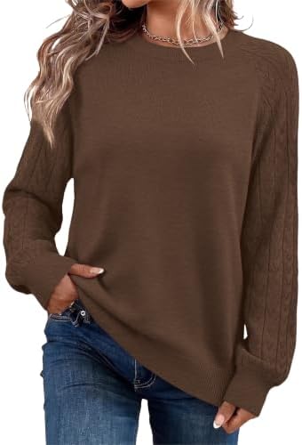 A deep coffee brown yarn knit into a classic crewneck pullover with snug ribbed cuffs for breezy evenings and cool days.