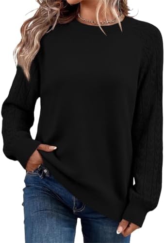 A deep black fine-gauge pullover knit with smooth viscose yarns and ribbed cuffs for easy layering on cool nights.
