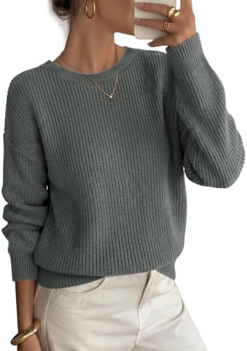 A soft ribbed crewneck sweater in neutral grey, cut with dropped shoulders for an easy, relaxed drape on breezy days.