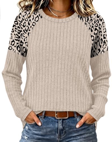 Tonal leopard raglan sleeves bring subtle pattern to this lightweight cream beige knit tunic with a classic ribbed crew neckline.