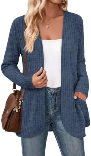 Lightweight brushed knit creates an open front layer with deep side pockets and a relaxed hip-length drape in deep navy blue.