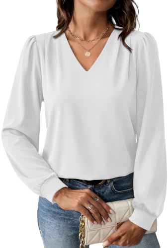 Soft shoulder pleats and gathered cuffs give this crisp white long sleeve blouse a clean, easy drape.