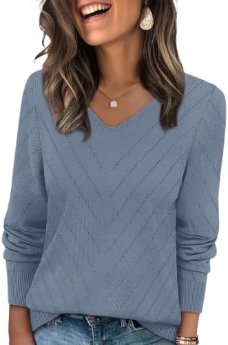 Open crochet stitches and a cool blue grey tone make this lightweight knit easy to wear over tanks or under tailored blazers.