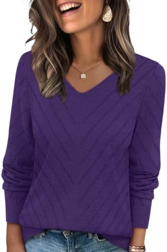 A soft crochet knit in rich purple, cut with an open V-neck and ribbed trim for lightweight layering across cool seasons.