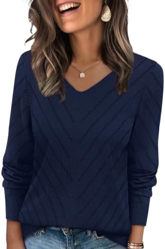 Crochet openwork adds delicate texture to this navy pullover, knit in a light yarn blend with a clean V-neckline.