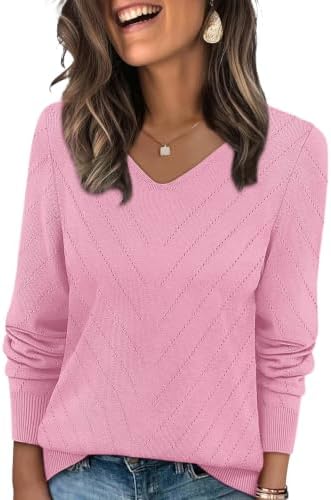 A soft blush pink knit gives this crochet-textured pullover a cheerful lift for cool mornings and air-conditioned classrooms.