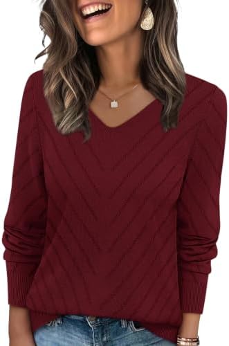 Airy crochet stitches and a rich wine red yarn give this relaxed V-neck sweater just enough warmth for breezy summer nights.