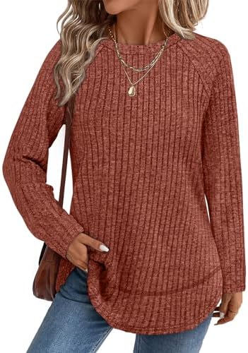 A ribbed caramel tunic top with raglan sleeves and a curved high-low hem that pairs easily with leggings on cool fall evenings.