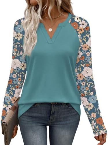 Raglan sleeves and bold graphic blue color blocking define this relaxed long-sleeve knit tunic made for cool evenings.
