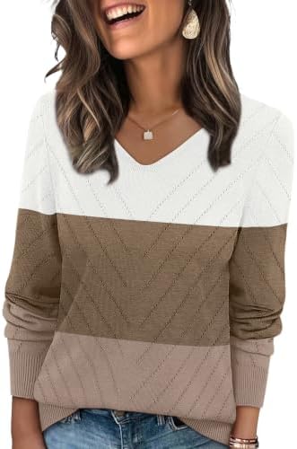 Warm earth tones meet breathable openwork in this color block knit top, cut with long sleeves and a neat V-neckline.