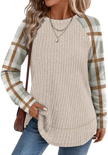 Soft ribbed knit in a warm apricot plaid print shapes this easy tunic, cut with a high-low hem and side slits for daily movement.